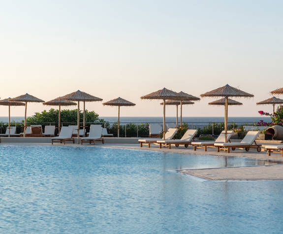 Paralos Rodos Lifestyle Hotel pool, sunbeds and umbrellas